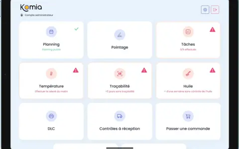 Tablette affichant l'interface Komia pour un restaurant, avec des tuiles pour le planning, le pointage, les tâches, la température, la traçabilité, l'huile, le DLC, les contrôles à réception et les commandes. Ce classement ERP aide à la gestion quotidi...